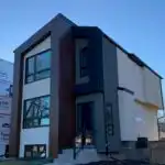 Winnipeg custom cladding vertical siding modern home exterior