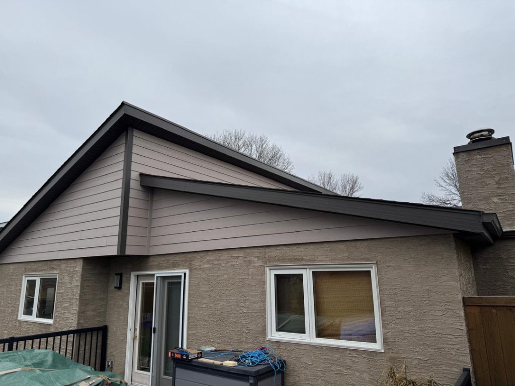 Modern home renovation winnipeg general contractor horizontal siding textured stucco roofing contractor 18ce4c50 fb5a 4371 b030 436332ad996c