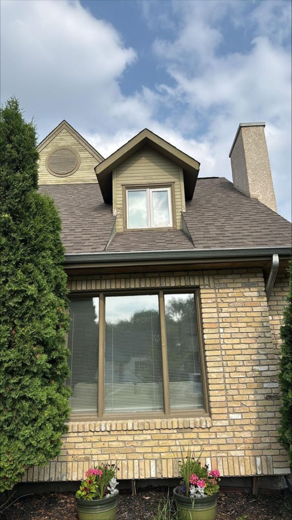 Winnipeg home renovation contractor brick house gable roof dormer window exterior renovations e167d7cc 1c01 4387 98af 3bfb35b325e9