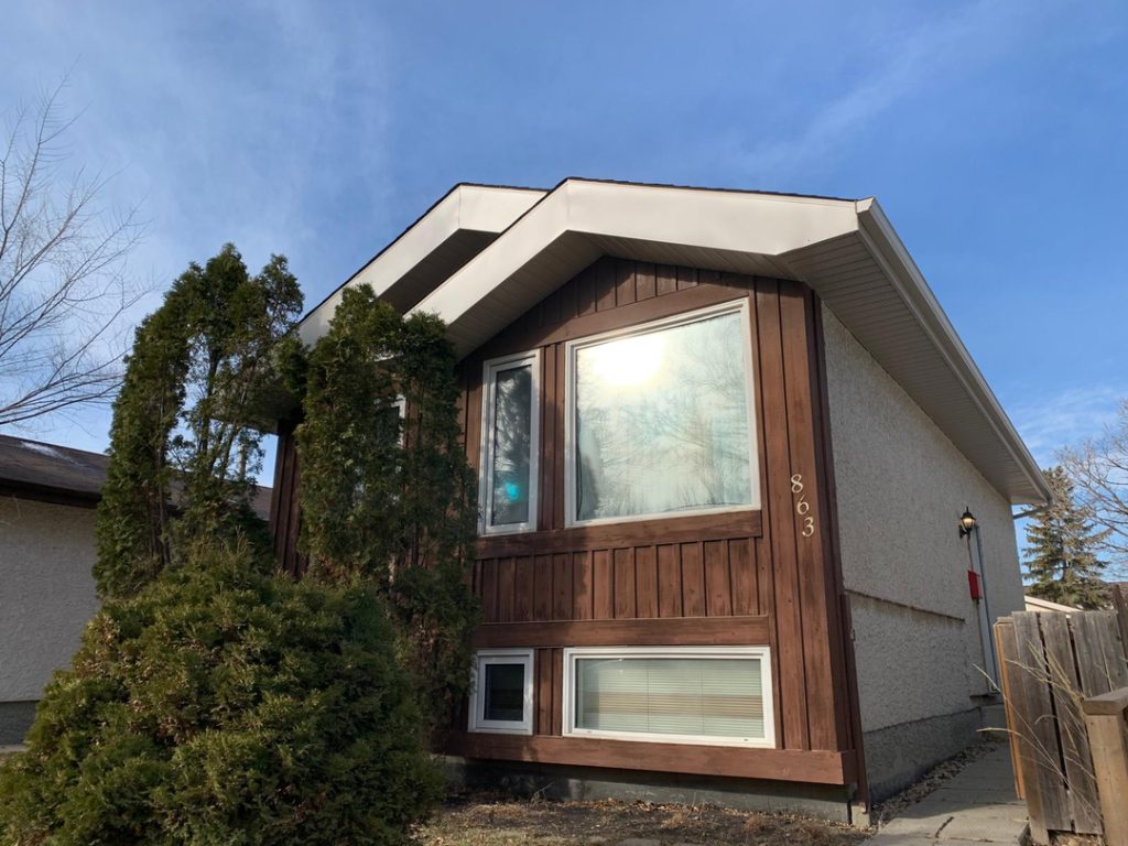 Winnipeg home renovation contractor brown wood siding exterior e92c18a7 b505 4b62 937f 29b76d85b7d9