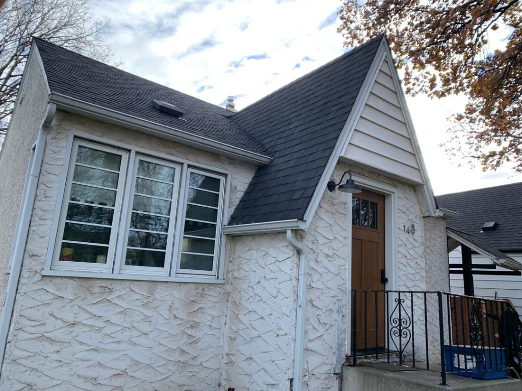 Winnipeg home renovation contractor textured siding shingled roof porch cbce7364 38ae 4a18 bf4f 5143cb5a6f67