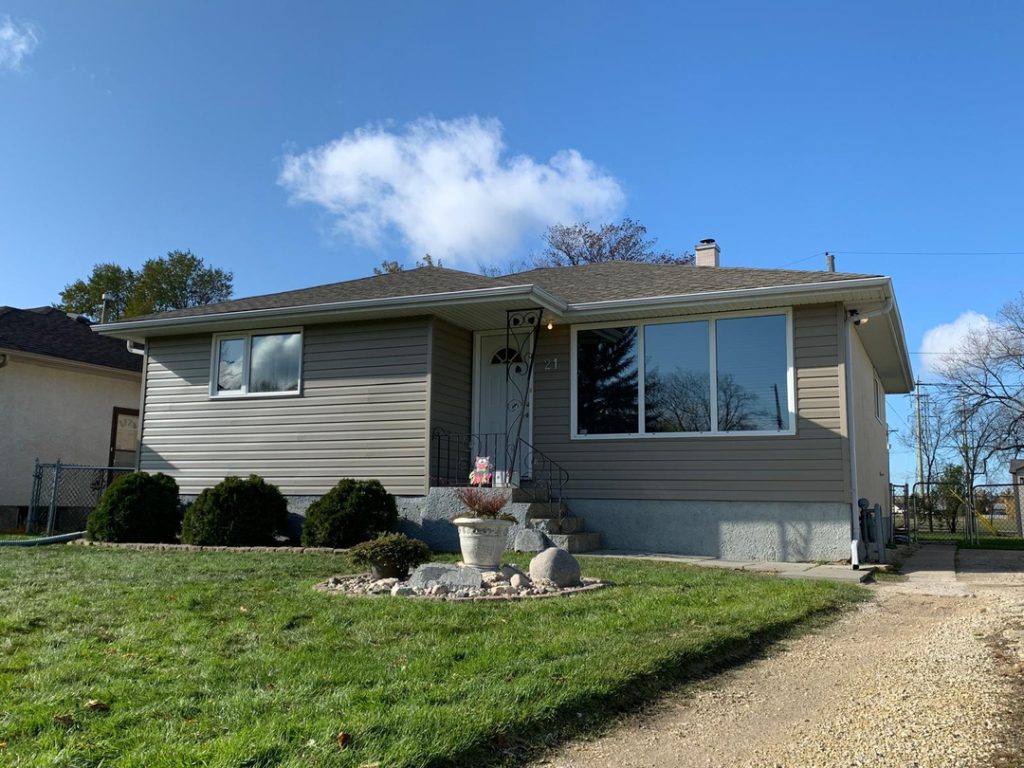 Winnipeg home renovation general contractor vinyl siding gravel walkway d29ede58 75b9 471f 9699 cf755ea9b1b7