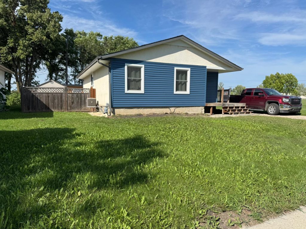 Winnipeg modern renovations contractor blue siding red truck exterior renovations 7e01d9f7 c2e0 4a7d 93fb cdd00a551f40