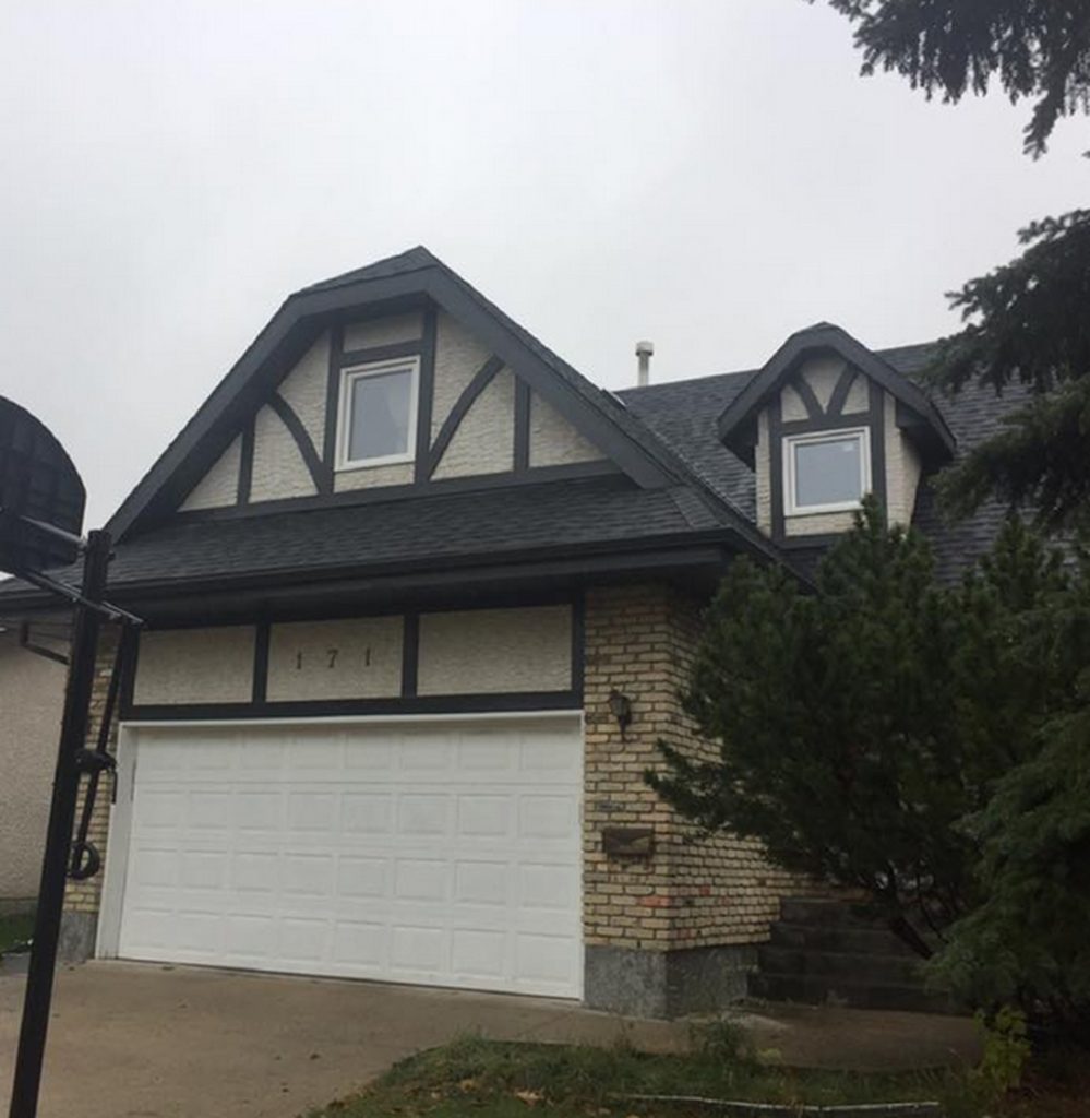 Winnipeg modern renovations general contractor tudor roof home renovation exterior remodeling brick siding gutter replacement 574130f4 2c0d 494b 9c0d 000932866d89